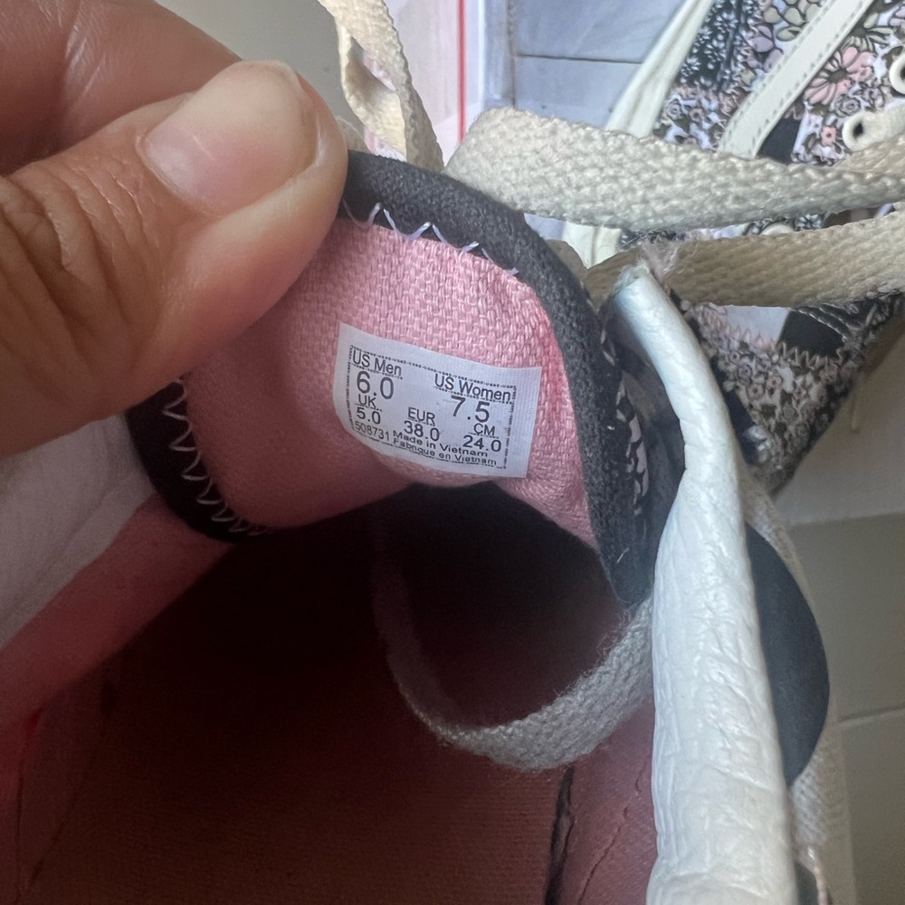 Vans Women's Sneakers with Pink and Black Accents